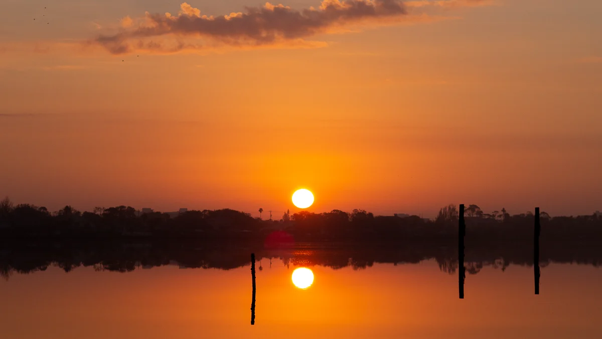 Sunset reflected across a local waterway