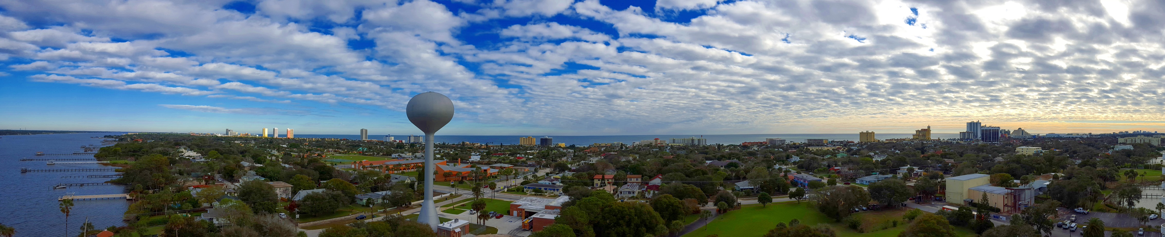 Panoramic view from a Daytona Beach riverfront condo building toward the Halifax River and Atlantic coastline